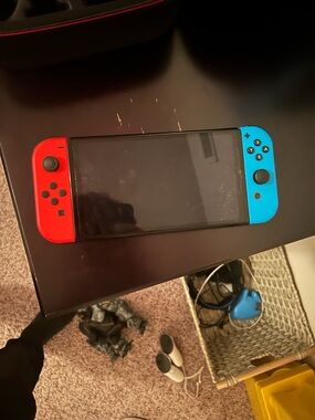 Nintendo Switch with Neon Red & Neon Blue Joy-Con/ MORE INCLUDED (BUNDLE)
